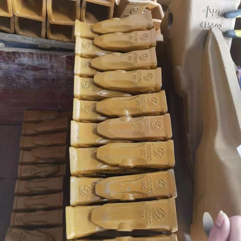 Adaptatore di denti a secchio per escavatori e piastra della lama miglior prezzo e denti a secchio duro
