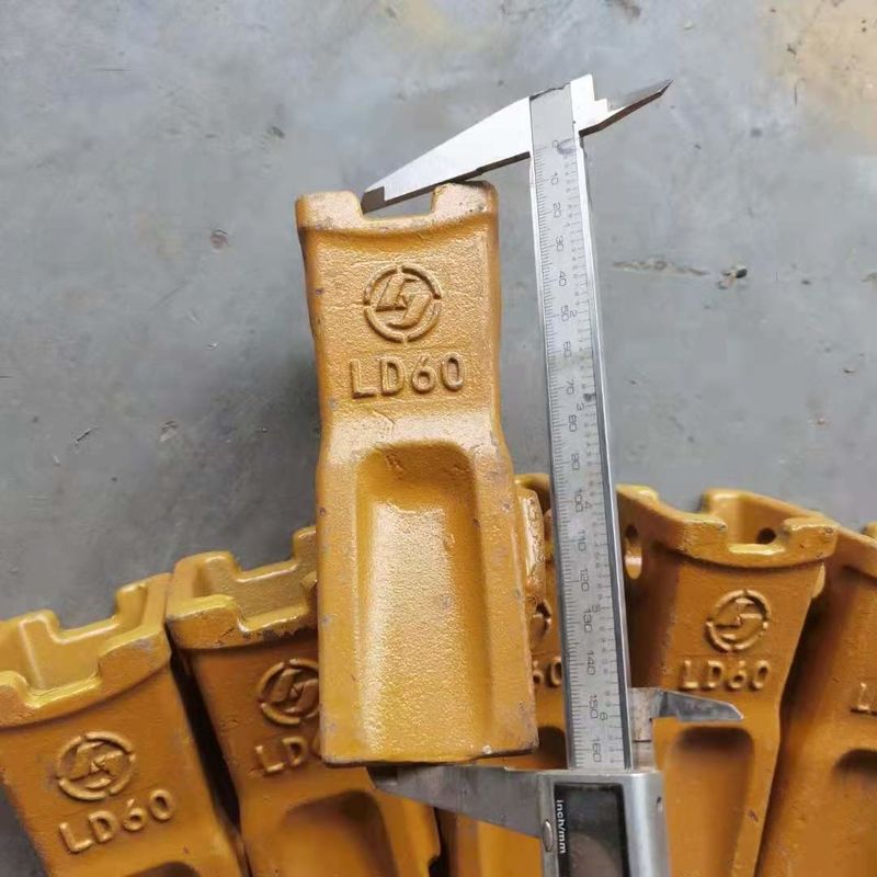 Escavatore Dente di secchio Miglior prezzo E rigido Dente di secchio Difficile Pin Dente di secchio